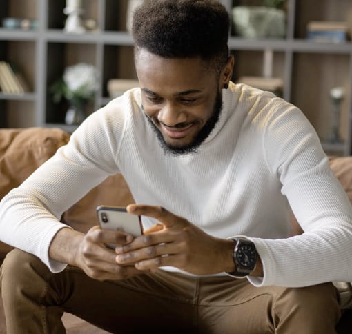 man texting using his smartphone