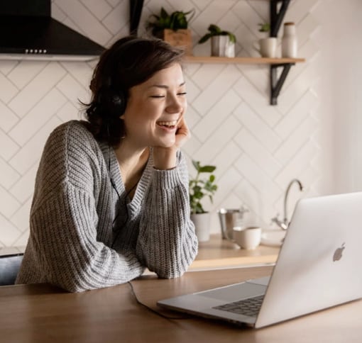 woman videocalling via laptop